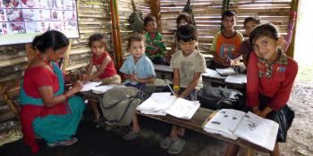 Children during a lesson in a Temporary Learning Centre supported by VSO in Lamjung district, Nepal. Children during a lesson in a Temporary Learning Centre supported by VSO in Lamjung district, Nepal.