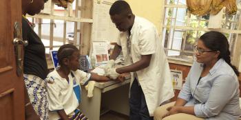 Andrew Sesay with Dr Padma and patients Andrew Sesay with Dr Padma and patients