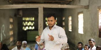 Lead farmer Md. Rezaul conducts a farmers training session with Alipur Boro Vita Farmers Group at Alipur, Kafrikhal, Rangpur, Bangladesh.