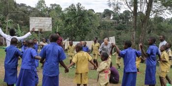 Jo Doyne playing with children from Ngwino Nawe village,