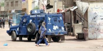 A police vehicle stops in a neighbourhood in Karachi, Pakistan