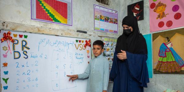 Salma and Saad in the the VSO learning centre.