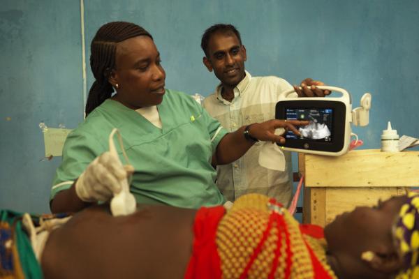Isha, who is five months pregnant with her second child, receives an ultrasound scan at Batanoi Community Health Centre
