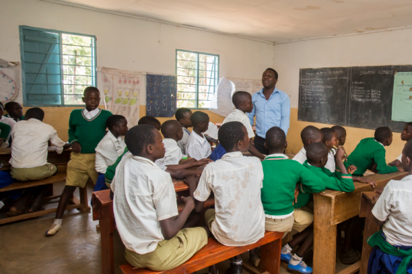 A VSO trained teacher speaks to his class