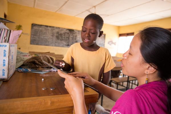 Education volunteer with seven year old Blessing, Boltanga, Ghana. Mary worked to support initiatives increasing access to education for children with disabilities in, Talensi District.