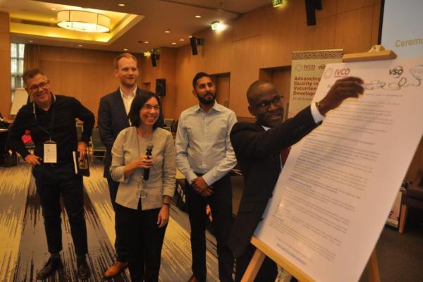 Fred Sadia, Secretary and National Coordinator at Volunteer Involving Organizations Society - Kenya, signs the Kigali Declaration at IVCO 2019