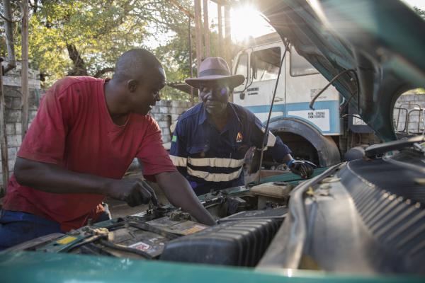 Witness and Patmos work together on a car engine