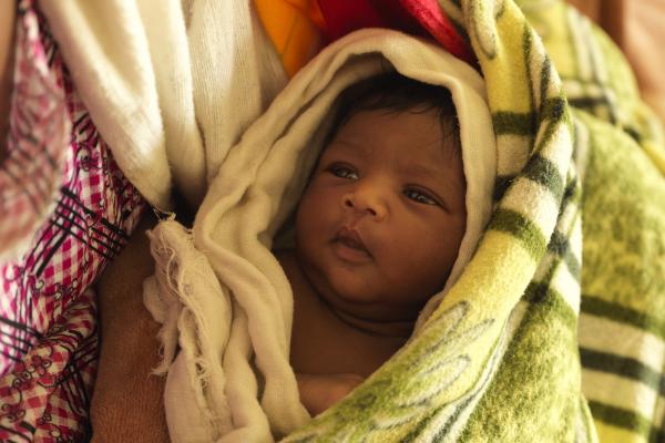 A newborn baby is wrapped in blankets at Mulu Asefa Primary Hospital