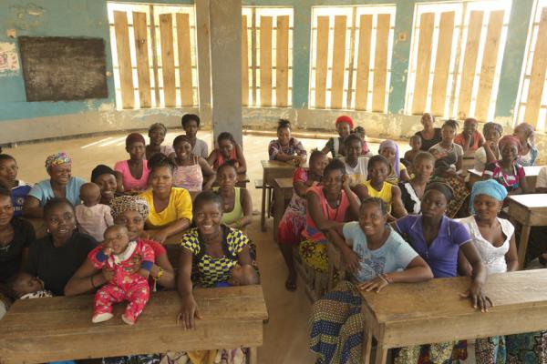 Teenage mothers with their babies in a school in Sierra Leone