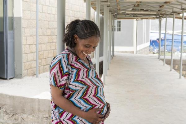 An expectant mother, safe knowing she will be well looked after