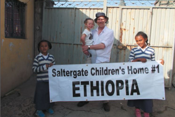 Former volunteer Kevin Morley with some children at Saltergate Children's Home in Ethiopia