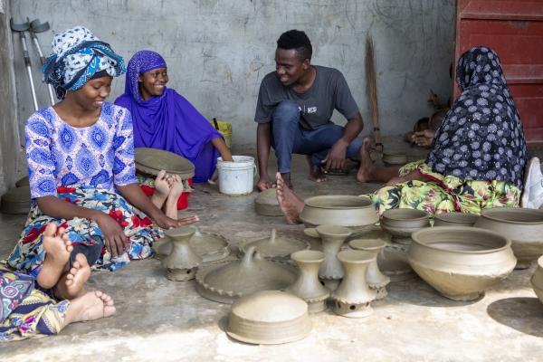 Youth volunteers in Tanzania. ICS volunteers have been working to support Tunavvwza pottery group for women with disabilities, Stone Town, Zanzibar.