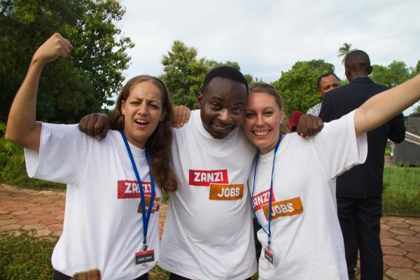 VSO / Randstad volunteers celebrate the successful Zanzi job fair, Zanzibar.