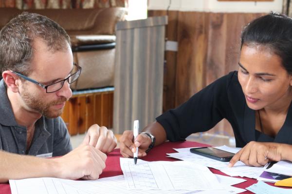 James running a feedback session with a Big Sister, Nirmaya Badii, on the Sisters for Sisters' mentoring programme.