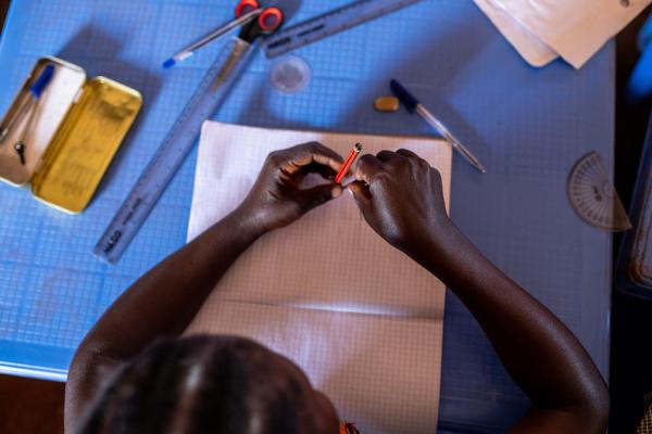 Workbook exercises during a maths class at Siabai catch-up centre, Migori, southwest Kenya