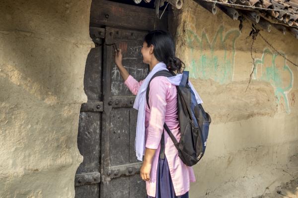 Big Sister knocks at door of Little sister in Nepal