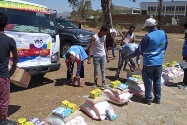 Volunteers sort food parcels to give to mothers