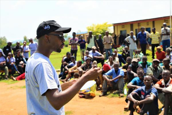 Papa Diouf addresses crowd at community clean up