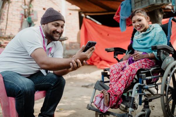Rabina, who was born with cerebral palsy, in her new wheelchair