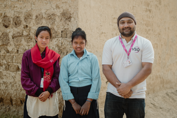 Volunteer Nitim with Panum, a student on the project