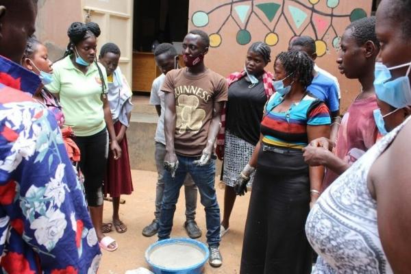 Hosea conducts a Briquettes workshop