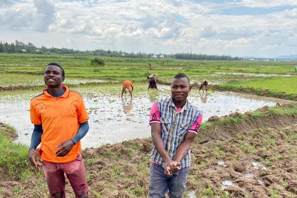 Young men in field