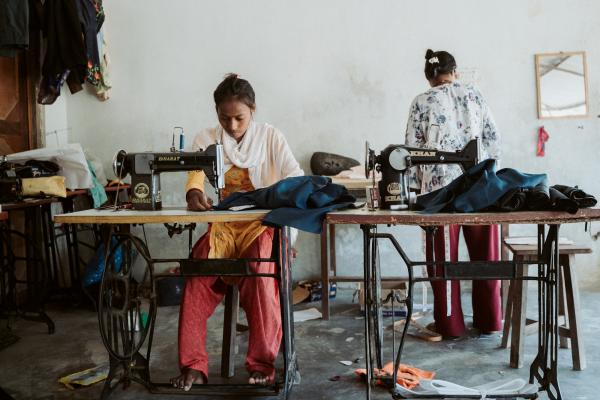 Women using sewing machines 