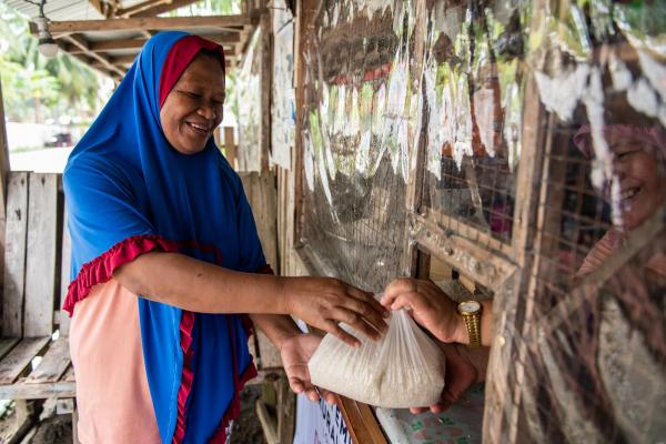 Woman selling rice