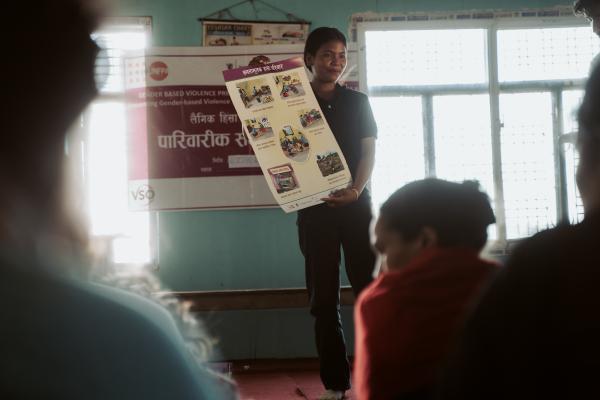 Volunteer in Nepal teaching a class 