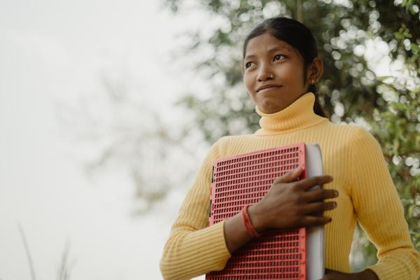 Parvati holding notebook