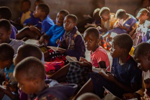 Group of children in busy classroom