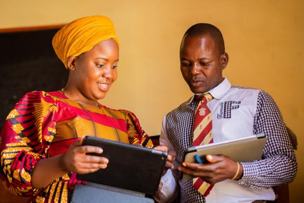 Volunteer Prisca and teacher Peter