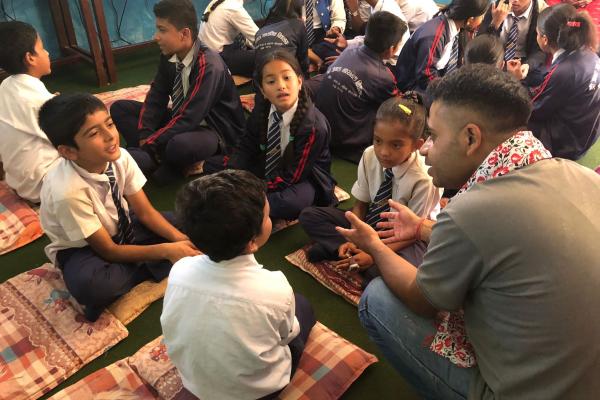 Dev in discusion with Grade 1 to 5 students. Janata Secondary School, Baglung, Nepal.