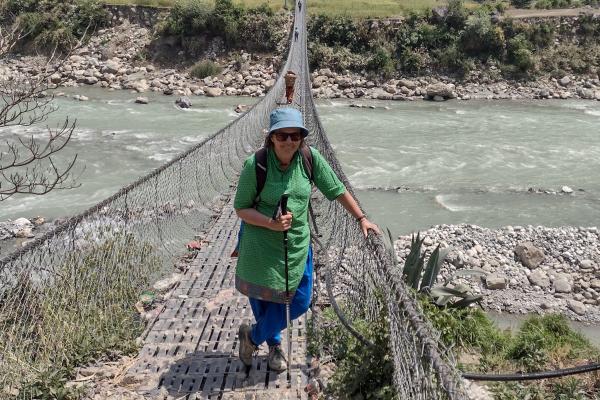 Anna Robinson on bridge in Nepal