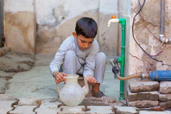 Boy washing his hands <Name>