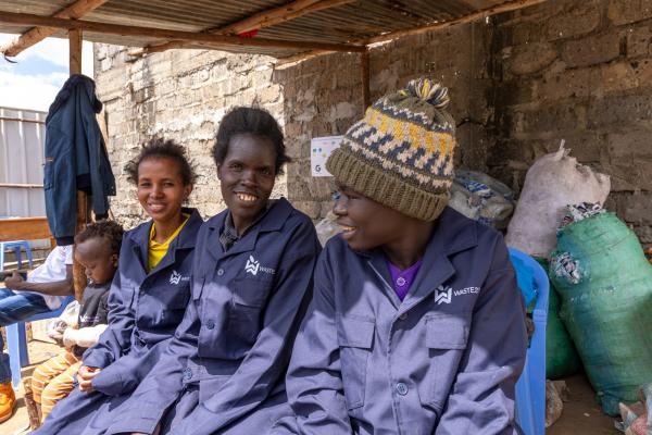 Three women in PPE