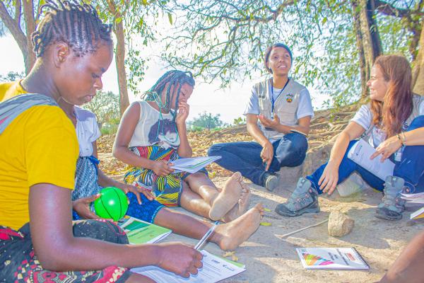 Group of girls learning outdoors