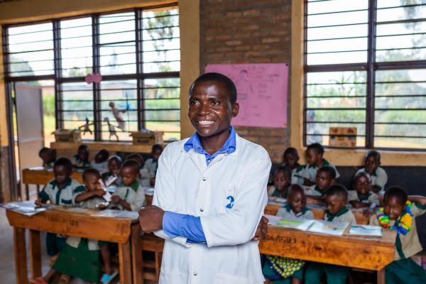 Primary school teacher Olivier smiling.