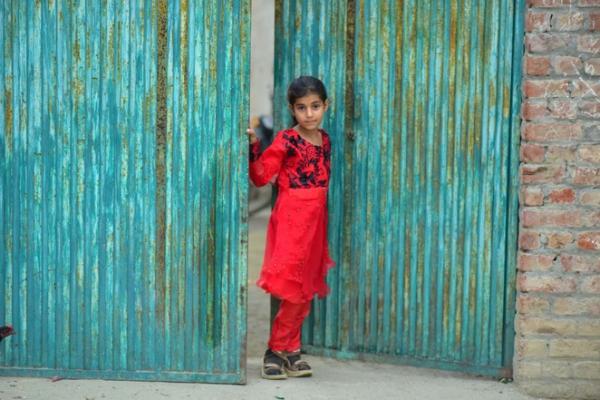 Nazia in the doorway