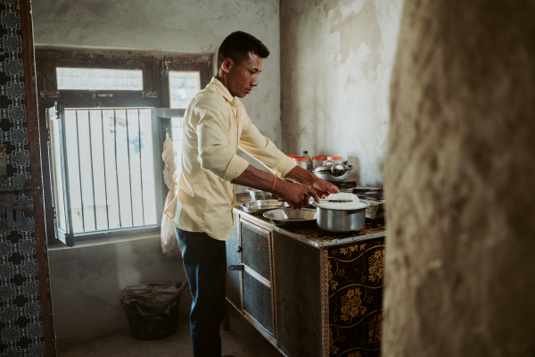 Laxman* in the kitchen cooking