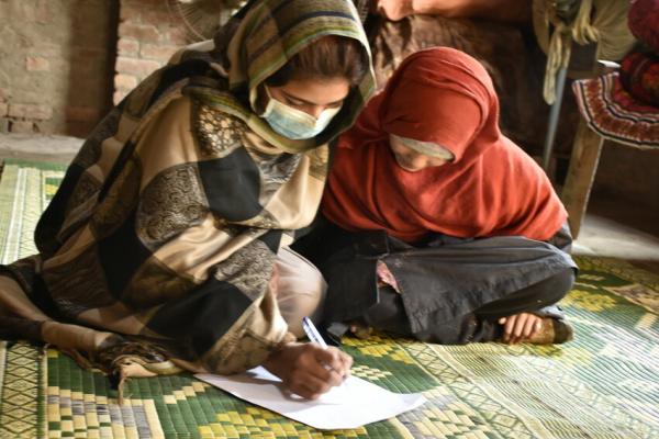 Teacher and child Pakistan education