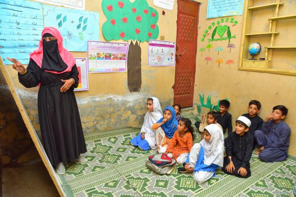VSO Volunteer Marya teaching children in a VSO early learning centre, Pakistan