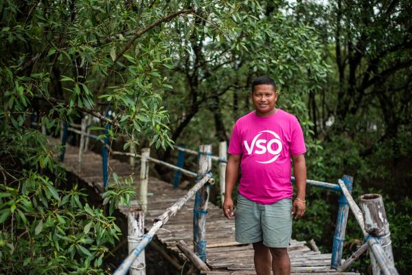 Jonito, VSO volunteer near the mangrove planting area.