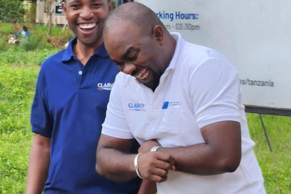 Dotto and Emeka laughing together