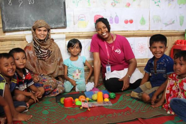 Ann Wambui with Rohingya children at one of the education centres at Cox's Bazar refugee camp. Ann Wambui with Rohingya children at one of the education centres at Cox's Bazar refugee camp.