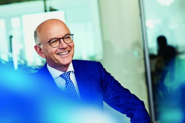 Randstad CEO Jacques van den Broek Jacques van den Broek smiling at the Randstad office