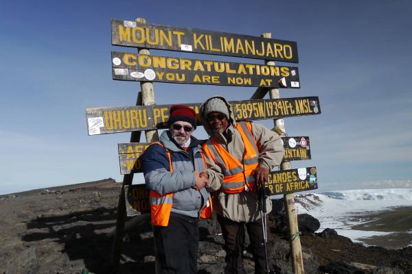 Keith Davies at Uhuru Peak, the top of Mount Kilimanjaro