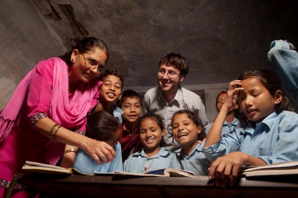 Teacher Bishnu Maya bhandrai , Prinsi, VSO volunteer Gareth and the class