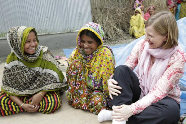Syngenta's Amanda Scott speaks with members of a women farmers' group in Bangladesh
