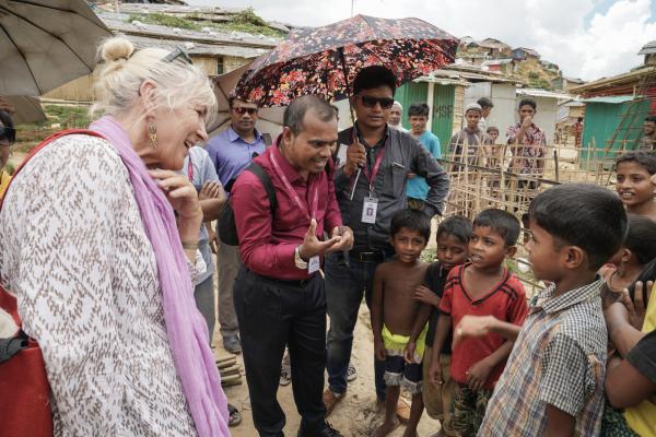  VSO volunteers with children in the Rohingya camps